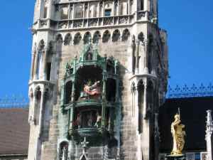 Munchen's Marianplatz and the joust at the top of the hour in the upper window of the Glockenspiel.